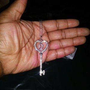 Breast cancer awareness key with pink ribbon